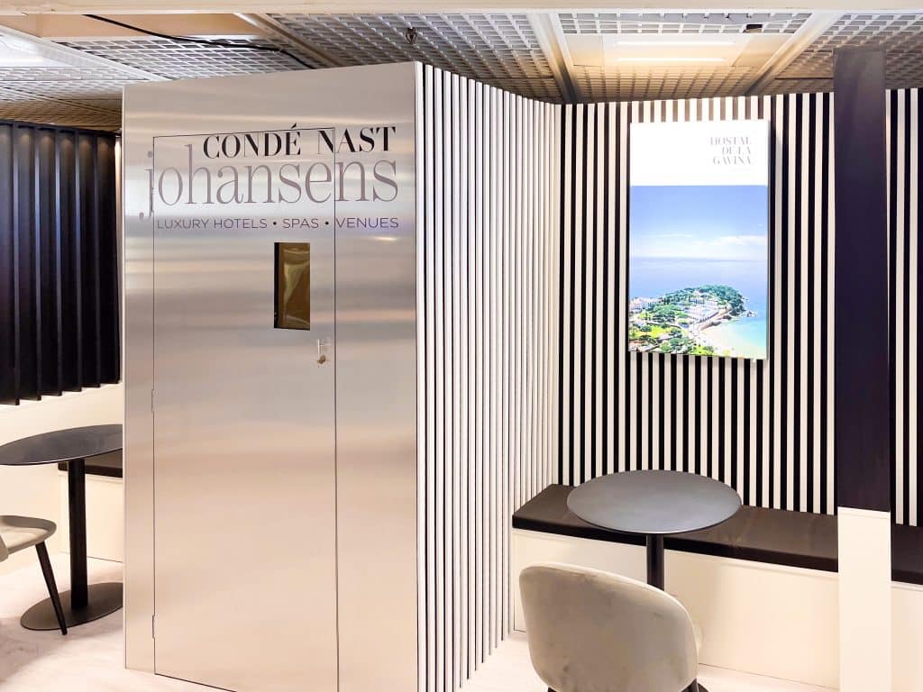 Stylish stand for luxury travel guide at ILTM